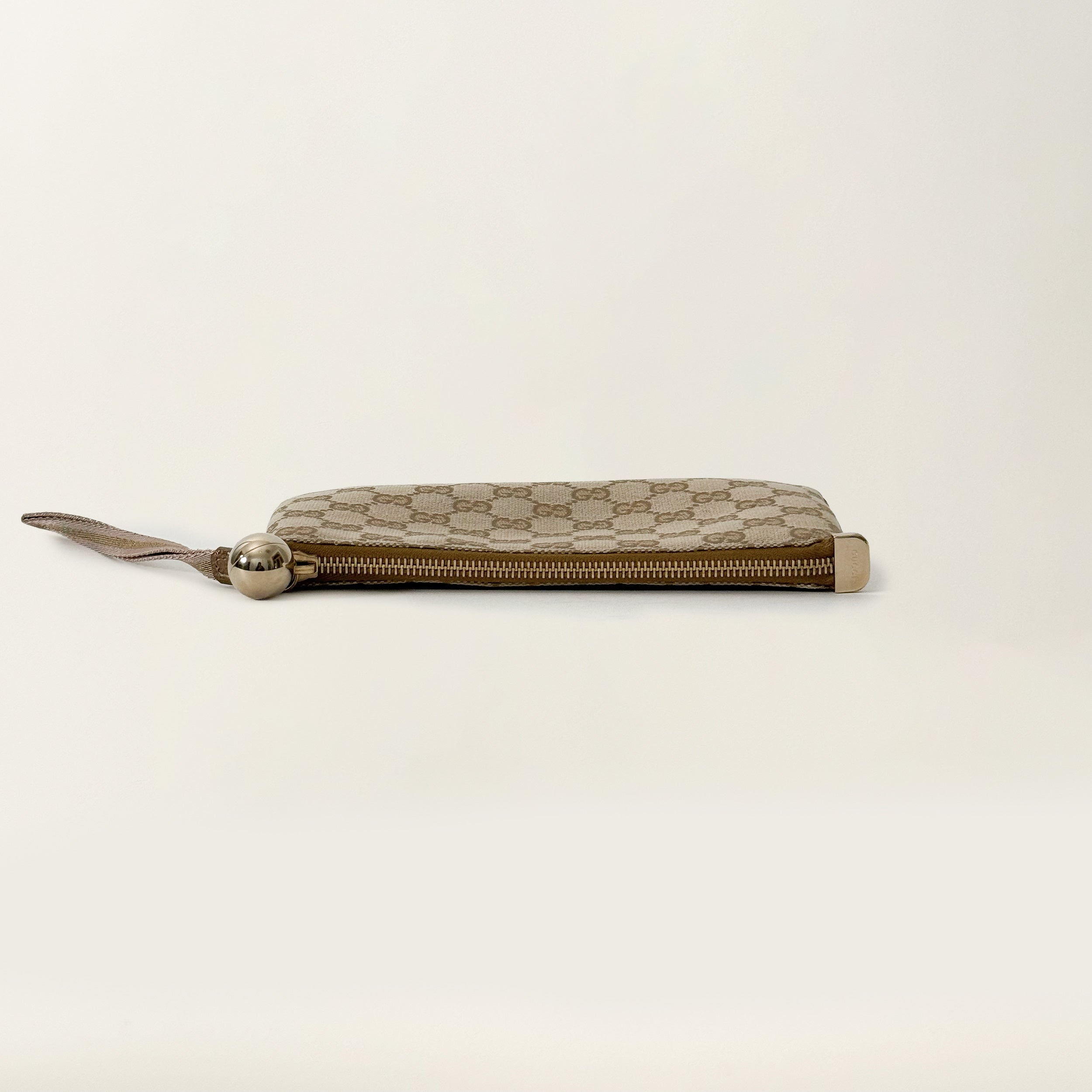 GG Monogram Clutch Gold
